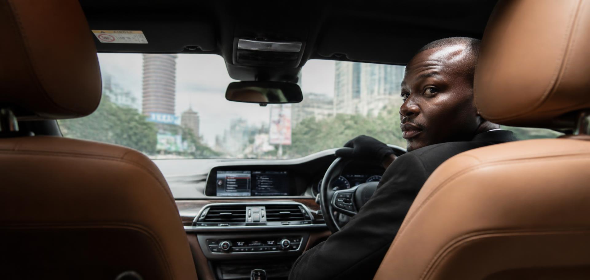 Wara Tours chauffeur at the wheel of a premium car in Nairobi